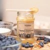 miel de bleuet 370g skarby roztocza texture cuillère bleuets