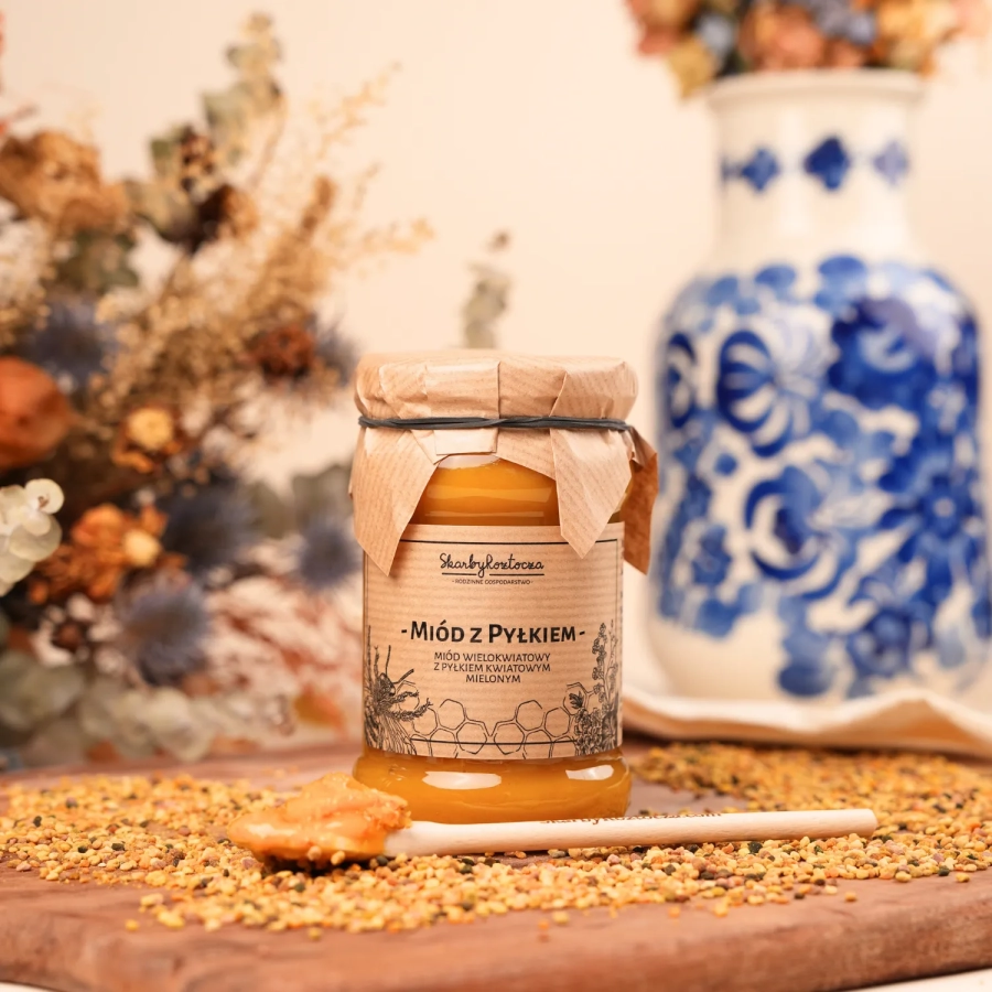 miel au pollen d'abeille moulu petit pot trésors de roztocze produit face carré