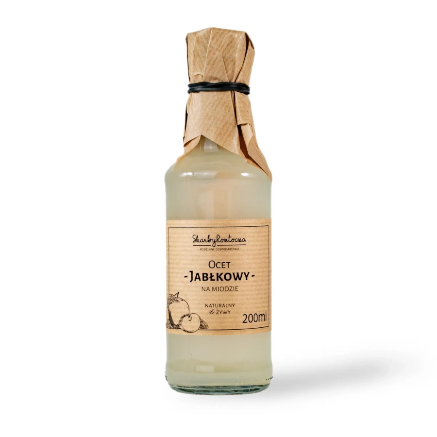 apple cider vinegar with honey treasures of roztocze white background